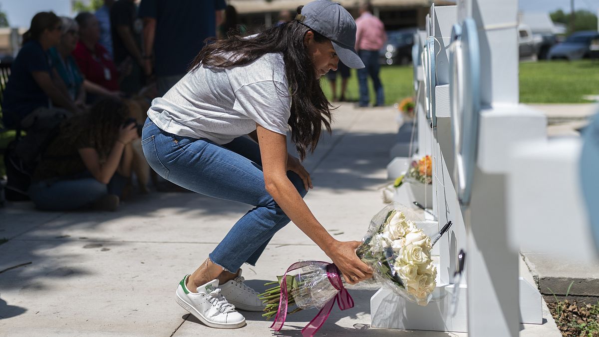 Meghan Markle, Duchess of Sussex, visits a memorial site, Thursday, May 26, 2022, honoring the victims killed in Tuesday's elementary school shooting in Uvalde, Texas,