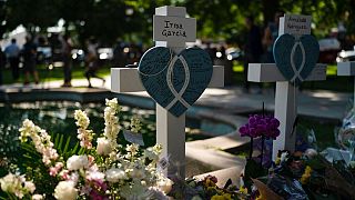 Messages are written on a cross honouring Irma Garcia, a teacher who was killed in this week's elementary school shooting, in Uvalde, Texas, Thursday, May 26, 2022.