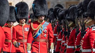 FILE - Britain's Prince William, Colonel of the Irish Guards, inspects the 1st battalion in the Quadrangle of Windsor Castle, 17 May 2022