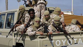 Forces loyal to Abdul Hamid Dbeibah, one of Libya’s two rival prime ministers, secure the streets of Tripoli on 17 May 2022