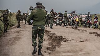 People flee fighting between Congolese forces and M23 rebels in North Kivu on 23 May 2022