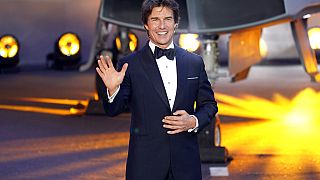 Tom Cruise poses for the media during the 'Top Gun Maverick' UK premiere at a central London cinema, on Thursday, May 19, 2022.