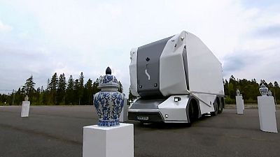 A Swedish freight technology company has demonstrated the precision of its self-driving electric truck by having a pair of them navigate a maze of China vases.