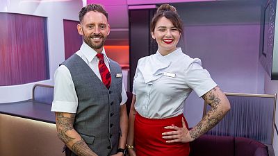 Should cabin crew be allowed to have visible tattoos? Virgin Atlantic says it’s the first UK airline to allow this.