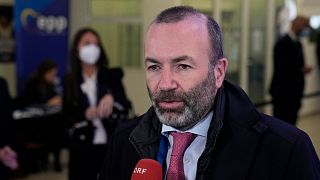 Chairman of the European People's Party group of the European Parliament Manfred Weber, talks to media as he arrives for a EPP meeting, March 2022