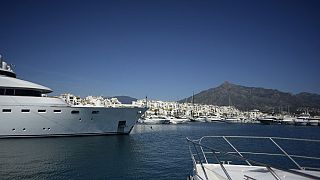 Yachts are seen in Puerto Banus luxury marina and shopping complex in Marbella on March 2, 2022.