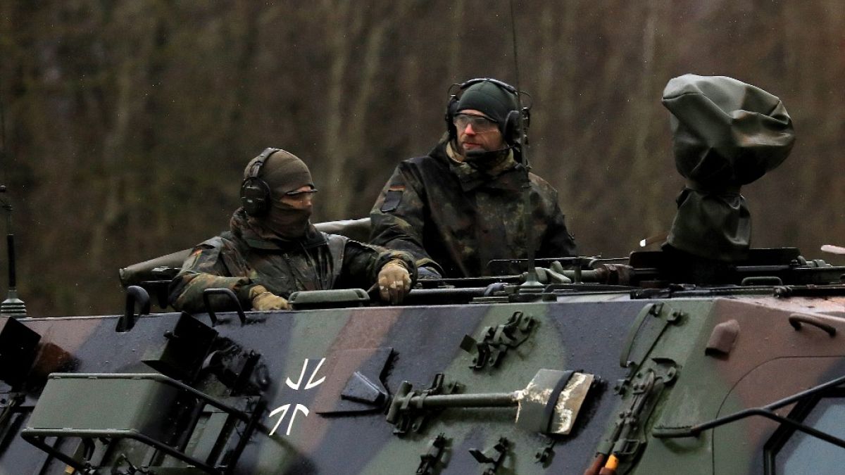 Soldiers of the German armed forces Bundeswehr arrive to reinforce NATO forces in Lithuania in Rukla, February 17, 2022.