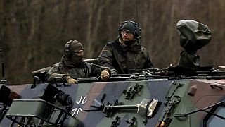 Soldiers of the German armed forces Bundeswehr arrive to reinforce NATO forces in Lithuania in Rukla, February 17, 2022.