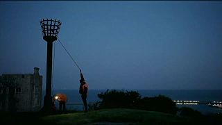 Two men tasked with lighting the Dover Town Beacon to mark Queen Elizabeth II’s Platinum Jubilee, struggled against breezy conditions on Thursday night, June 2.