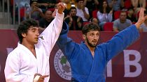 Girogi Shardalashvili raises the hand of Temur Nozadze after exhillerating final