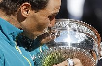 Spain's Rafael Nadal kisses the cup after defeating Norway's Casper Ruud in their final match of the French Open tennis tournament on 5 June 2022