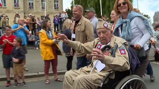 Military re-enactment parade on D-Day anniversary