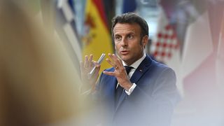 French President Emmanuel Macron speaks to media after a meeting of EU leaders on Ukraine, energy and food security in Brussels, May 31, 2022.