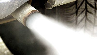 Gas leaves the exhaust pipe of a car in Frankfurt, Germany.