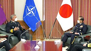 NATO Military Committee chief Rob Bauer, left, meets with Japanese Chief of Staff Koji Yamazaki