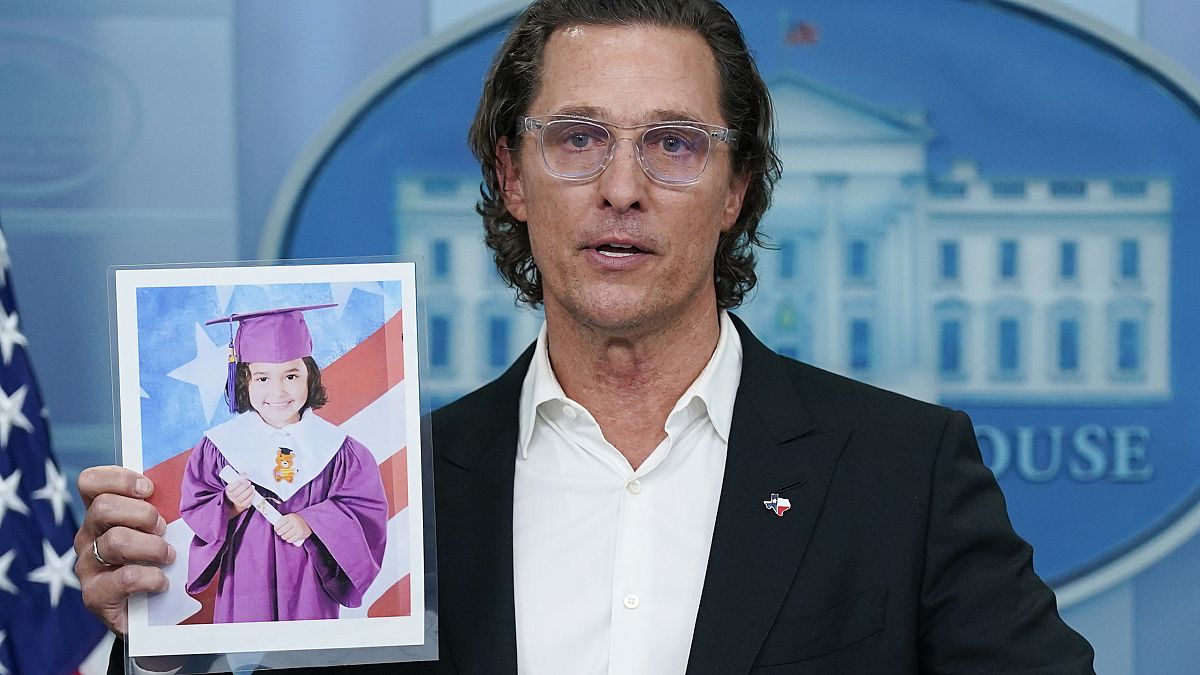 McConaughey holds a picture or Alithia Ramirez, 10, who was killed in the mass shooting at the Uvalde elementary school last month.