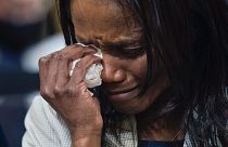 Serena Liebengood, widow of Capitol Police officer Howie Liebengood, cries as a video of the Jan. 6 attack on the U.S. Capitol is played during a public hearing