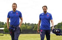 England's Harry Kane, left, walks with manager Gareth Southgate prior to a press conference ahead of Tuesday's UEFA Nations League soccer match