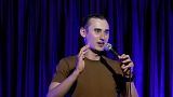 Serhiy Lipko performs in a stand-up comedy show in Kyiv, Ukraine