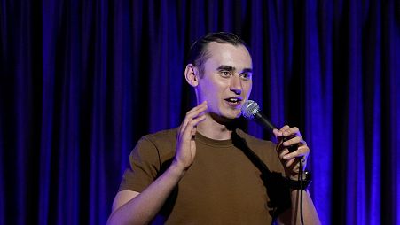 Serhiy Lipko performs in a stand-up comedy show in Kyiv, Ukraine