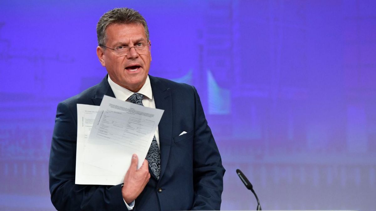 European Commissioner for Inter-institutional Relations and Foresight Maros Sefcovic holds up documents during a media conference at EU HQ, Wednesday, June 15, 2022