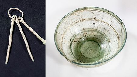 Image shows a toiletry kit and a tubular rimmed glass bowl excavated from Wendover, Buckinghamshire