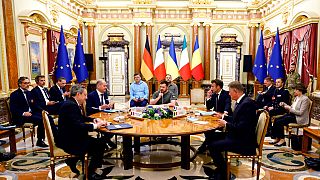 Klaus Iohannis, Mario Draghi, Emmanuel Macron et Olaf Scholz reçus par Volodymyr Zelensky à Kyiv en Ukraine, le 16 juin 2022