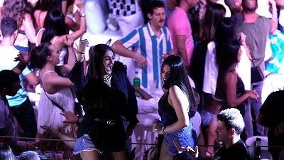 Women dance at the Taiga nightclub in Batroun village, north of Beirut, Lebanon.