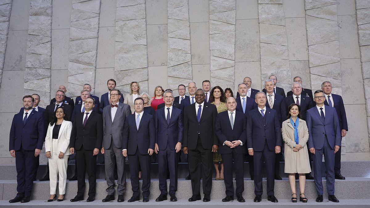 NATO Secretary General Jens Stoltenberg, front centre left, and US Defence Secretary Lloyd Austin, front centre right, and NATO defence ministers, Brussels, June 16, 2022.