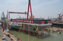 Le "Fujian", troisième porte-avions chinois, lors de sa mise à l'eau le 17 juin 2022 au chantier naval de Shangaï