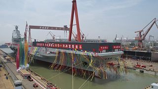 Le "Fujian", troisième porte-avions chinois, lors de sa mise à l'eau le 17 juin 2022 au chantier naval de Shangaï