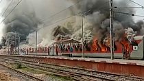 Protesters set trains on fire in India