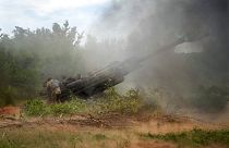 Ukrainian soldiers fire at Russian positions from a U.S.-supplied M777 howitzer in Ukraine's eastern Donetsk region, June 18, 2022