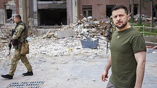 Volodymyr Zelenskyy inspects damaged buildings as he visits the war-hit Mykolaiv region