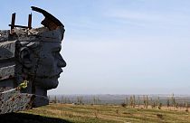 A picture shows a damaged statue at the World War II Savur Mohyla memorial in Snizhne, some 80km east of Donetsk, on October 15, 2014.
