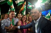 Partido Popular (PP) candidate for the Andalusian regional election Juanma Moreno greets supporters following the Andalusian regional elections, in Seville on June 19, 2022.