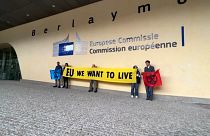 Extinction Rebellion demonstrators protest in front of the European Commission
