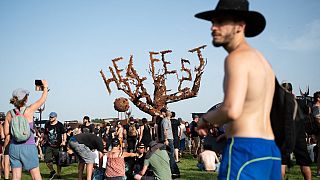 June 17, 2022 Festival goers attend the Hellfest Summer Open Air rock festival in Clisson, western France.