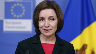 Moldova's President Maia Sandu poses for photographers prior to a meeting with European Commission President Ursula von der Leyen