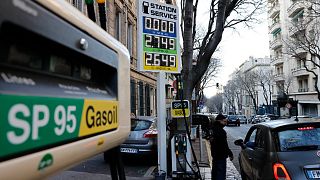 A car stops in a gas station where prices are up to 2,75 euros per liter (US dlrs. 3.04) in Marseille, southern France, Wednesday, March 9, 2022