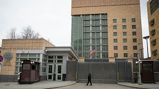 A security staff patrols the U.S. Embassy in Moscow.