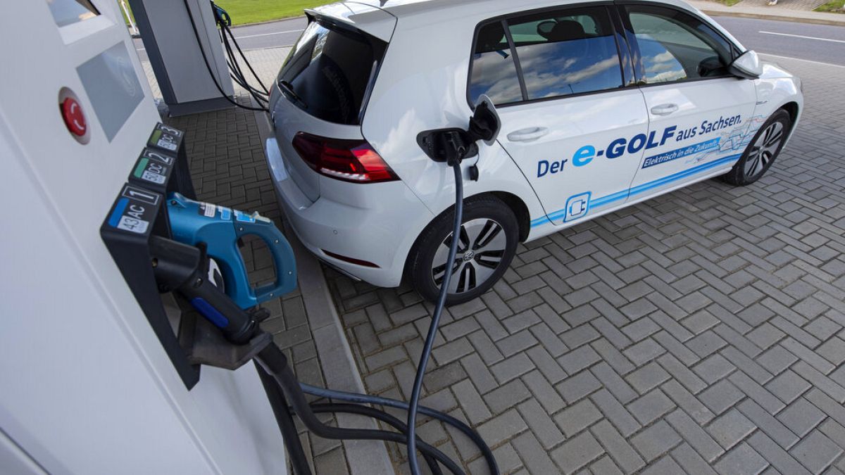 A parking placed is reserved for electrical cars in front of a charging station during a press tour of the plant of the German manufacturer Volkswagen AG
