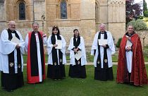 Honorary Canon candidates stand with the Bishop of Oxford and Archdeacon of Oxford.