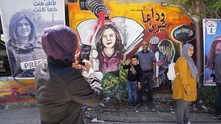 Palestinians visit the site where veteran Palestinian-American reporter Shireen Abu Akleh was shot and killed, in the West Bank city of Jenin