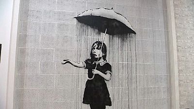 "Девочка с зонтиком", Бэнкси