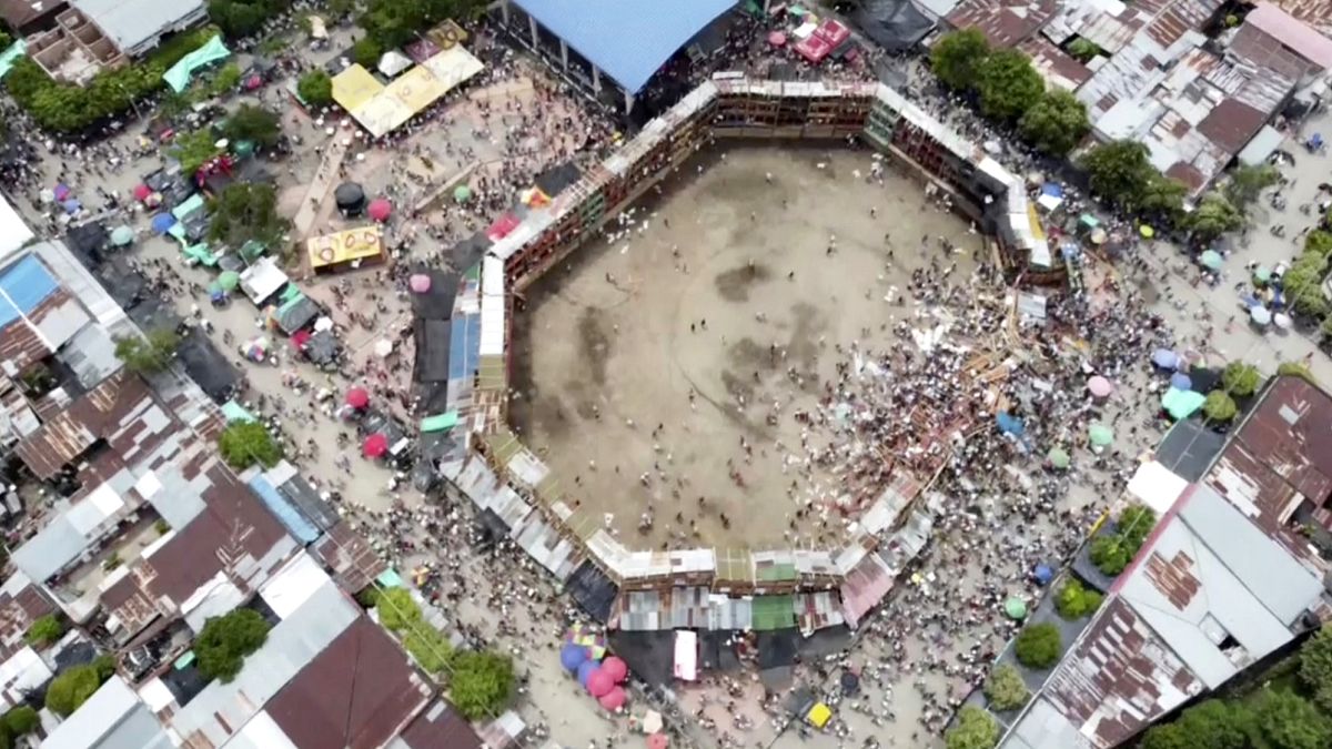 An image taken from video shows the scene after part of a wooden stand collapsed at a bullfight, Sunday, June 26, 2022, at El Espinal in Tolima state, central Colombia.