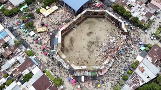 An image taken from video shows the scene after part of a wooden stand collapsed at a bullfight, Sunday, June 26, 2022, at El Espinal in Tolima state, central Colombia.