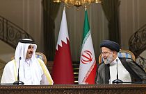 İran Cumhurbaşkanı İbrahim Reisi (sağda) Katar Emiri Şeyh Tamim bin Hamad el-Tani (sağda)
