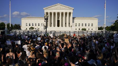 Protesters fill the street in front of the Supreme Court after the court's decision to overturn Roe v. Wade