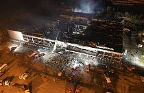 Un incendio en un centro comercial tras un ataque con cohetes en Kremenchuk, Ucrania, 27/6/2022